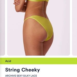 Going out of Sale-Sale!!!!  
Parade Acid Green String Bikini